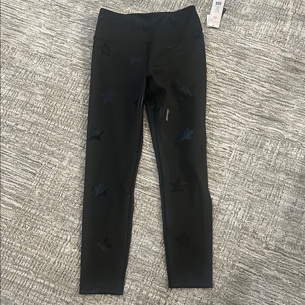 Nanette Lepore play black leggings w/ Stars Black on Black 
SZ Small